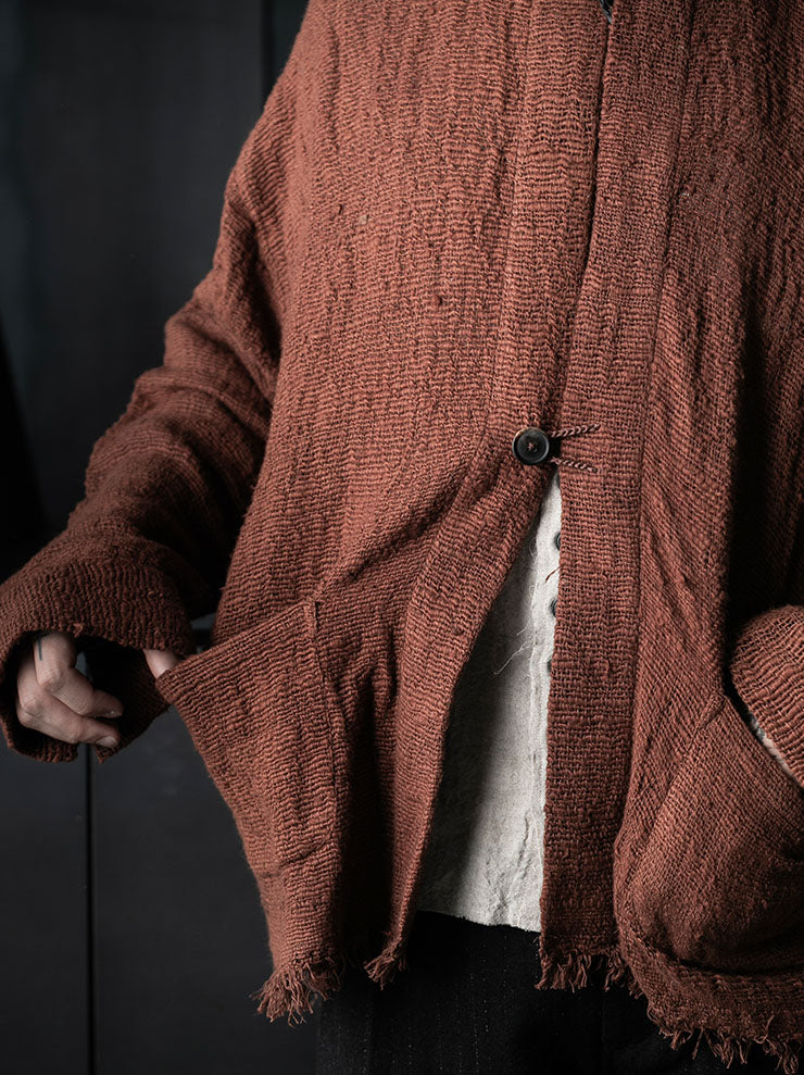 toward(s)<br />CARDIGAN IN MUD DYE TEXTURED COTTON / BRICK