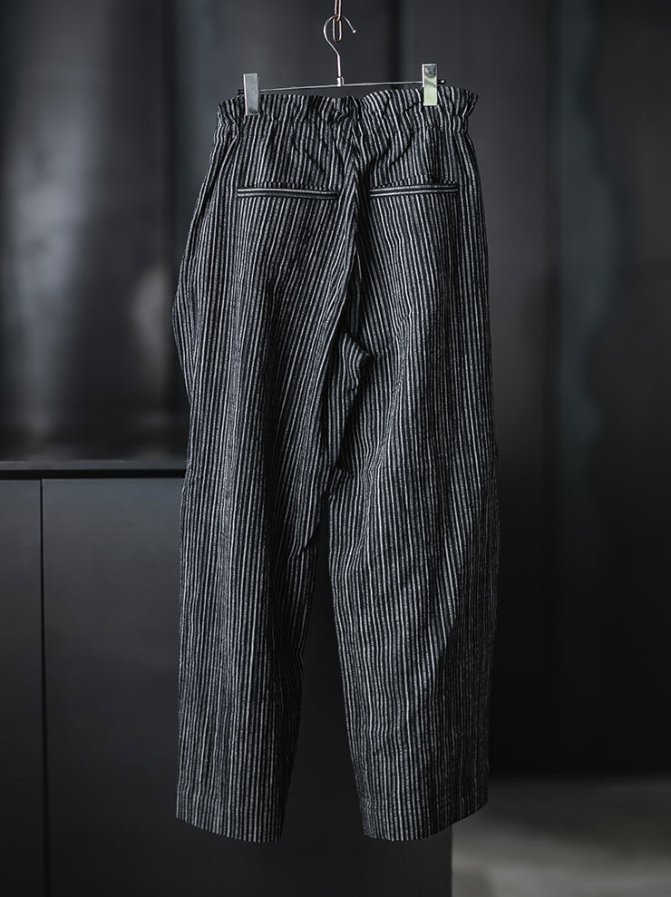 individual sentiments<br>UNISEX ラップワイドパンツ / black